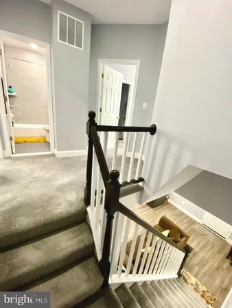a utility room with stainless steel appliances