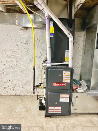 a bathroom with a toilet a sink a shower and mirror