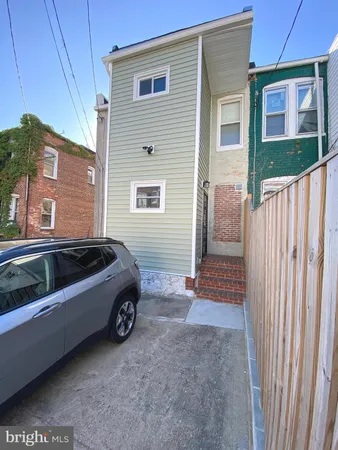 a front view of a house with a garage
