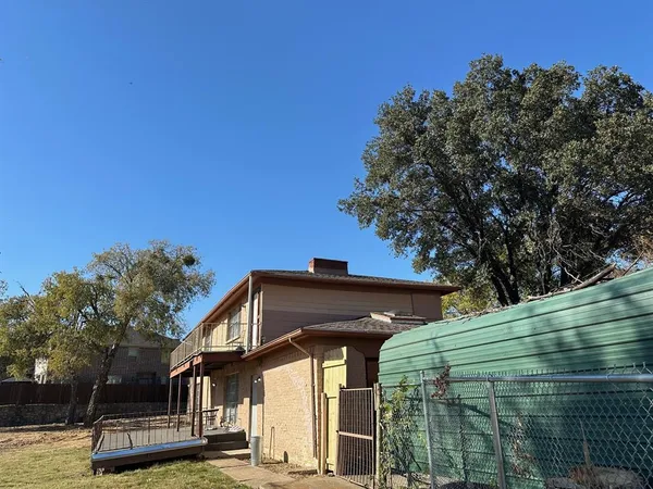 a view of backyard with green space