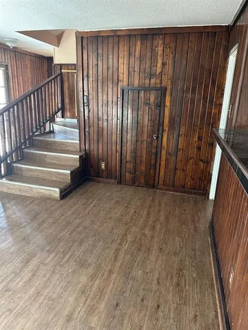 a view of an entryway with stairs