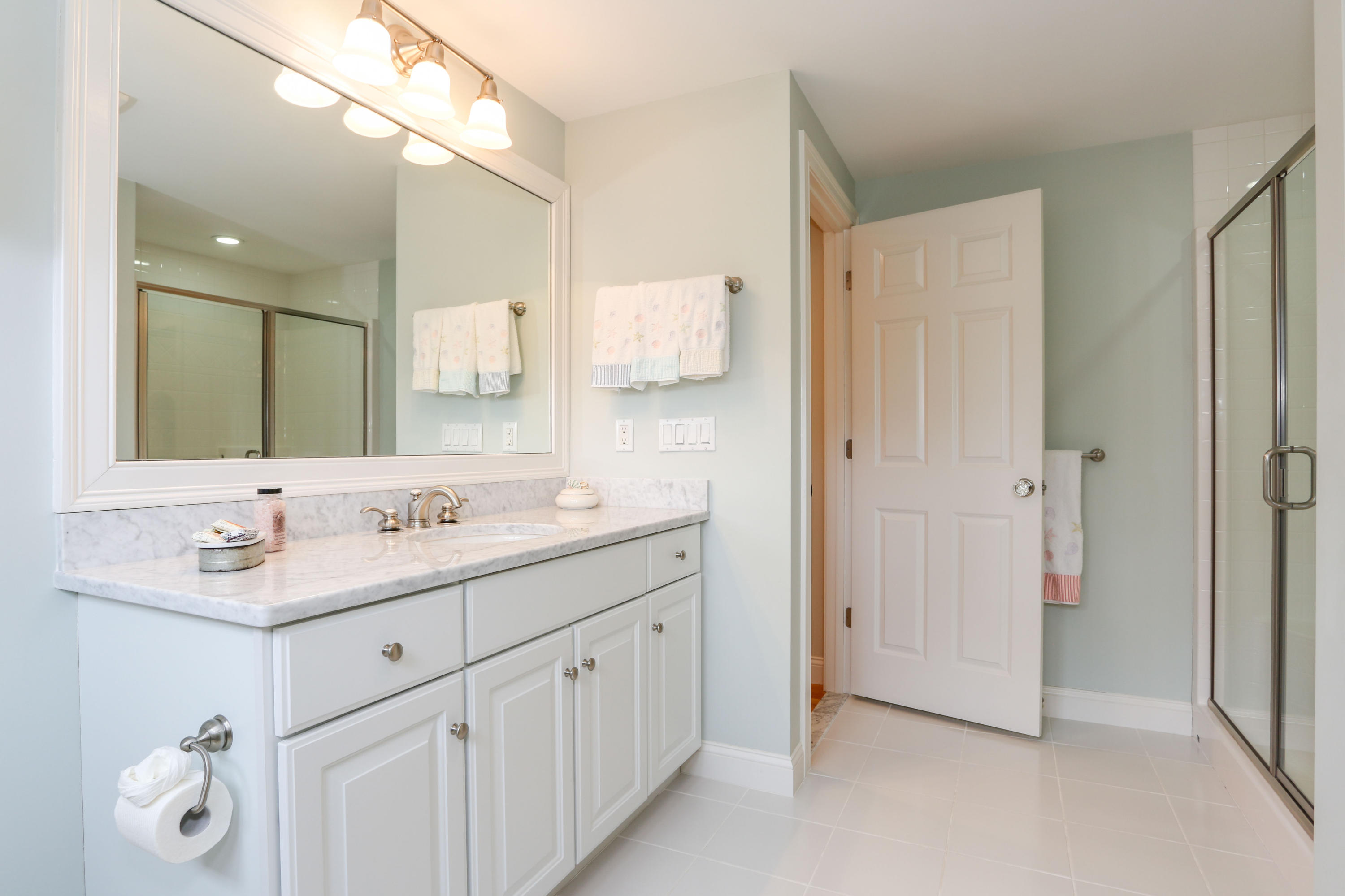 53 Blanid Road Osterville, MA 02655 - Photo 12 of 21 a bathroom with a double vanity sink mirror and