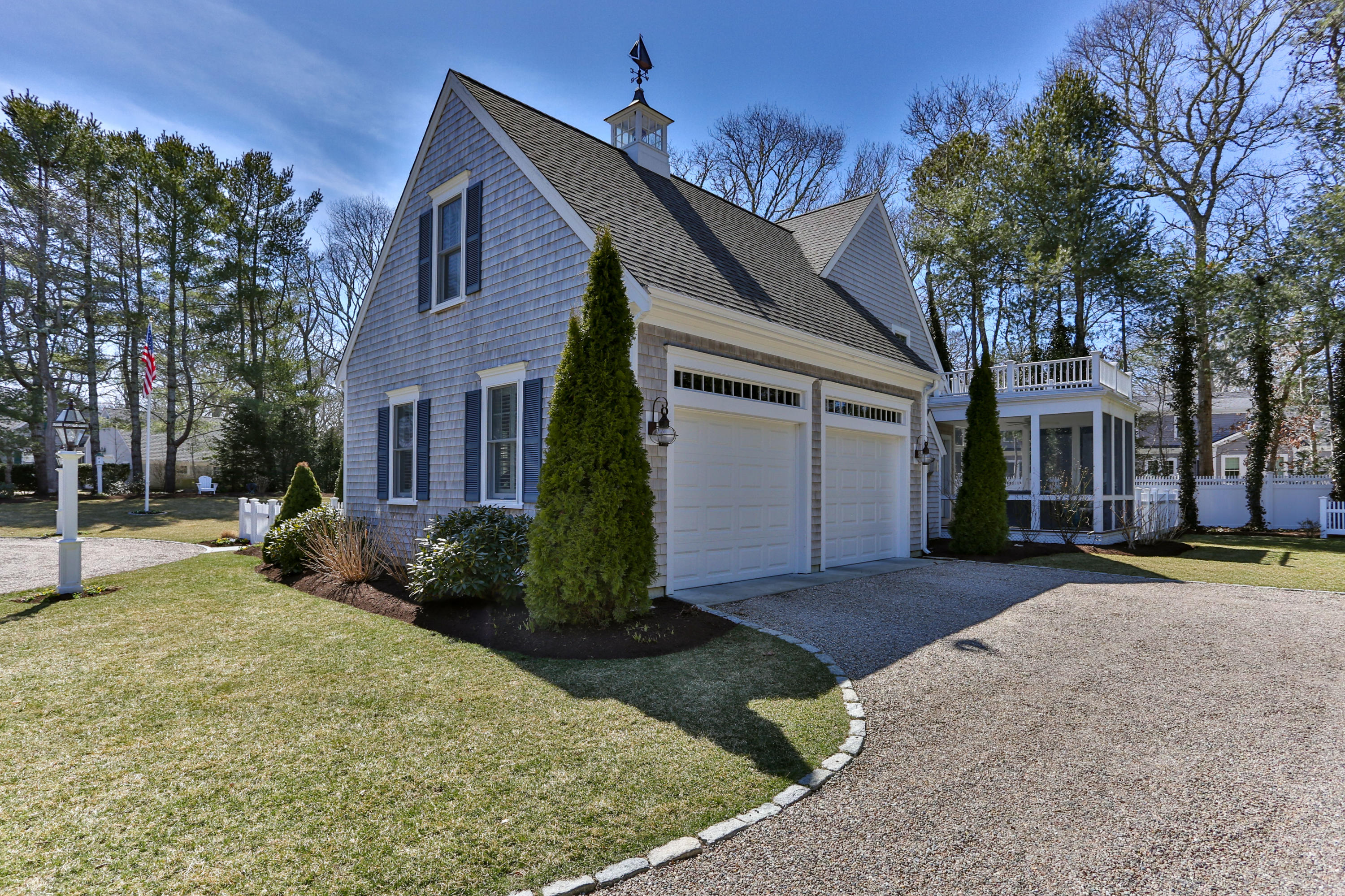 53 Blanid Road Osterville, MA 02655 - Photo 21 of 21 front view of a house with a yard