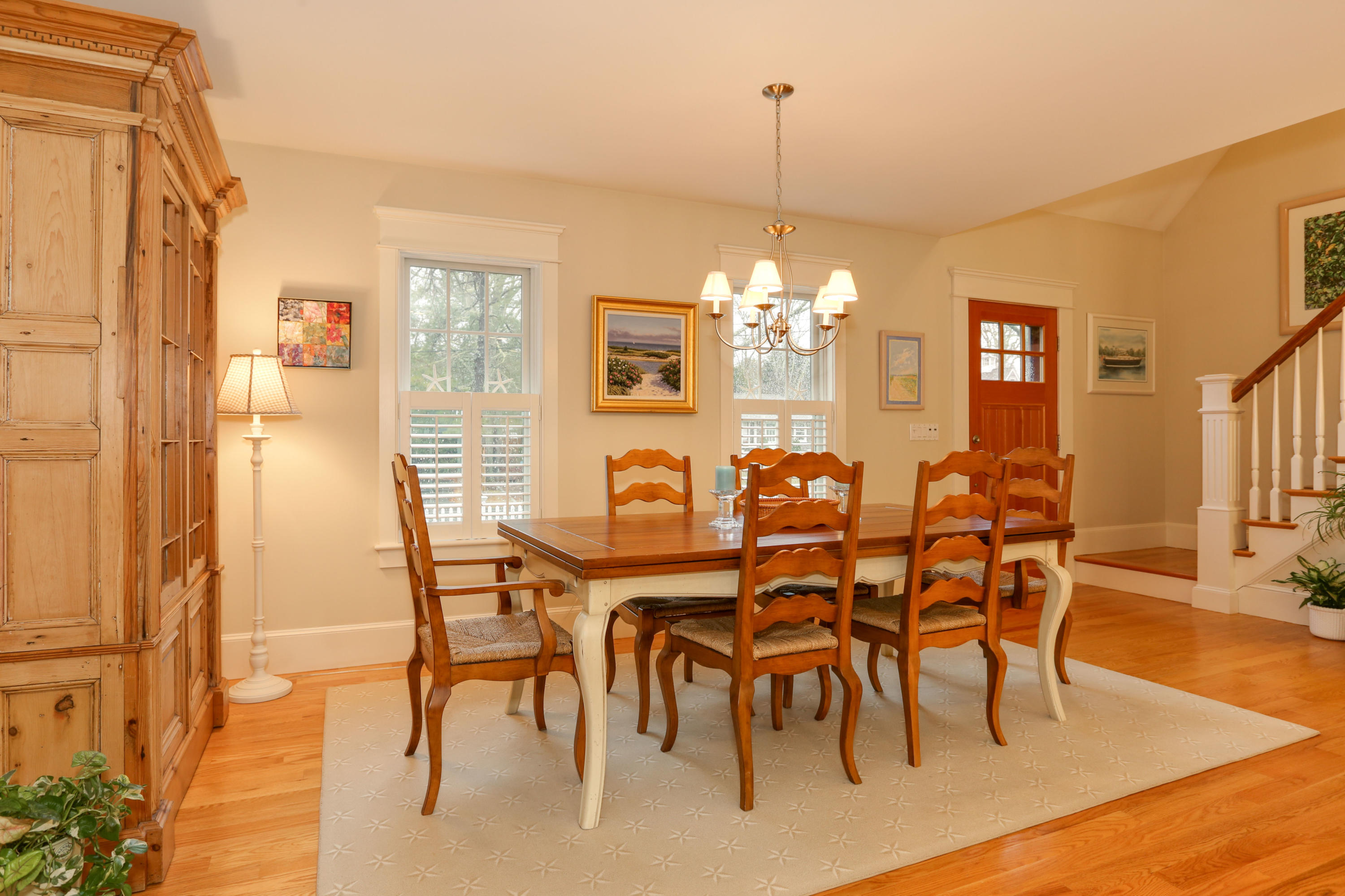 53 Blanid Road Osterville, MA 02655 - Photo 3 of 21 a view of a dining room with furniture and chandelier