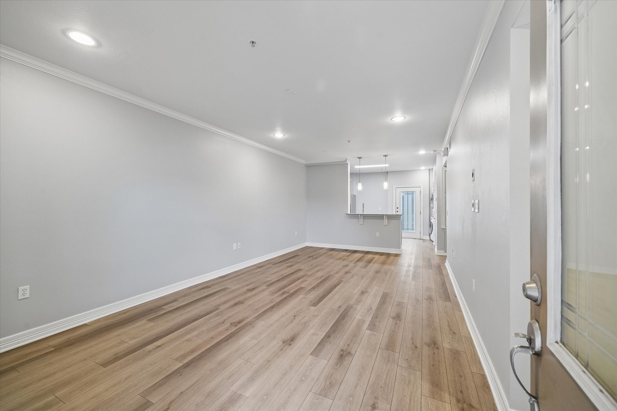 3501 Chenevert Street, Unit 7 Houston, TX 77004 - Photo 4 of 21 Open living/dinning room with recessed lighting