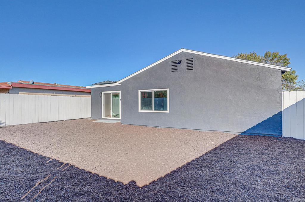 4205 Rene Drive San Diego, CA 92154 - Photo 28 of 29 a view of a house with a backyard