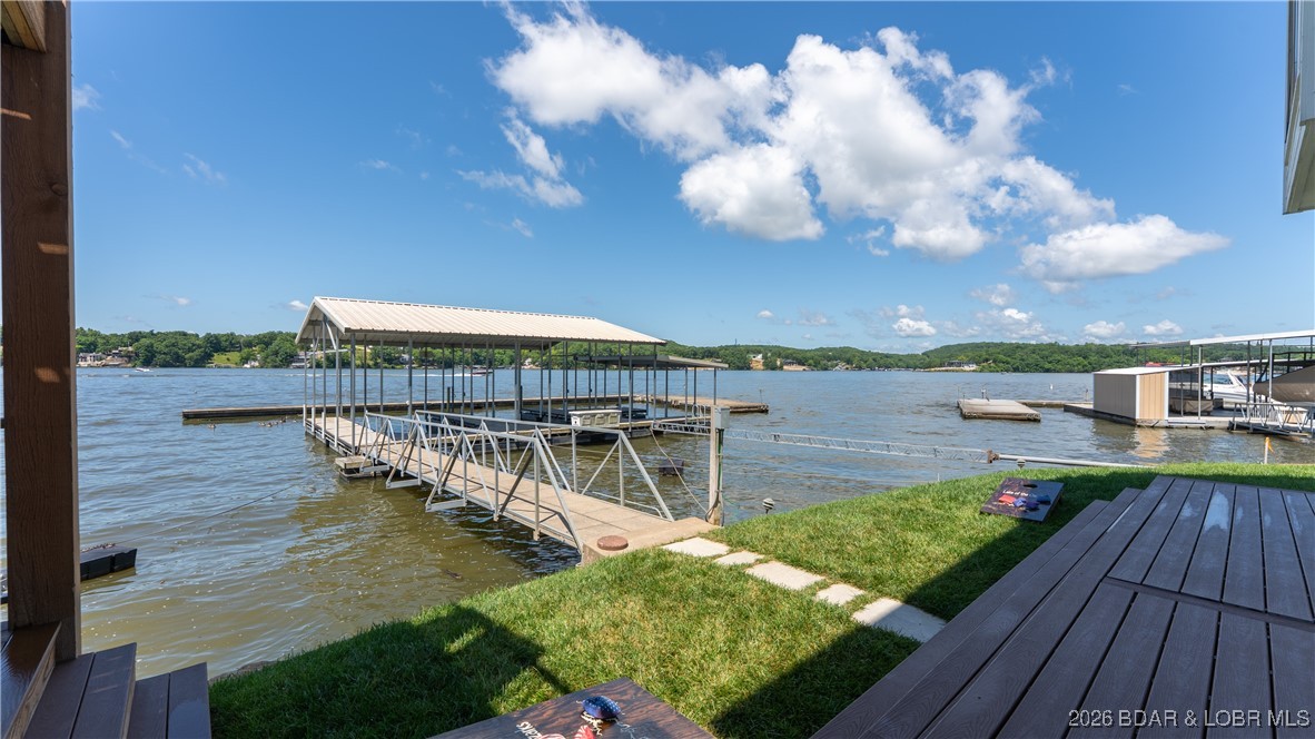 2268 Breezy Acres Road Osage Beach, MO 65065 - Photo 46 of 49 Nice and easy 3 steps to the dock from lower level