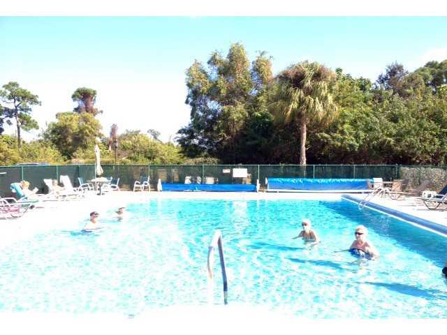 2950 Southeast Ocean Boulevard, Unit 1357 Stuart, FL 34996 - Photo 2 of 25 a view of a backyard