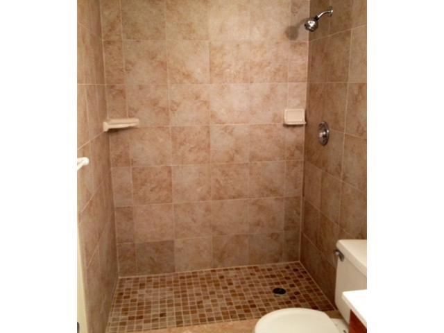 2950 Southeast Ocean Boulevard, Unit 1357 Stuart, FL 34996 - Photo 25 of 25 a bathroom with a shower