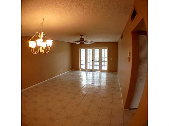 2950 Southeast Ocean Boulevard, Unit 1357 Stuart, FL 34996 - Photo 5 of 25 a view of a hallway with windows