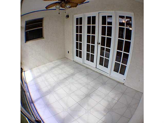 2950 Southeast Ocean Boulevard, Unit 1357 Stuart, FL 34996 - Photo 7 of 25 a view of an empty room with a cabinet