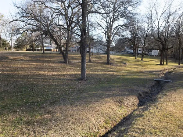 a view of road with trees