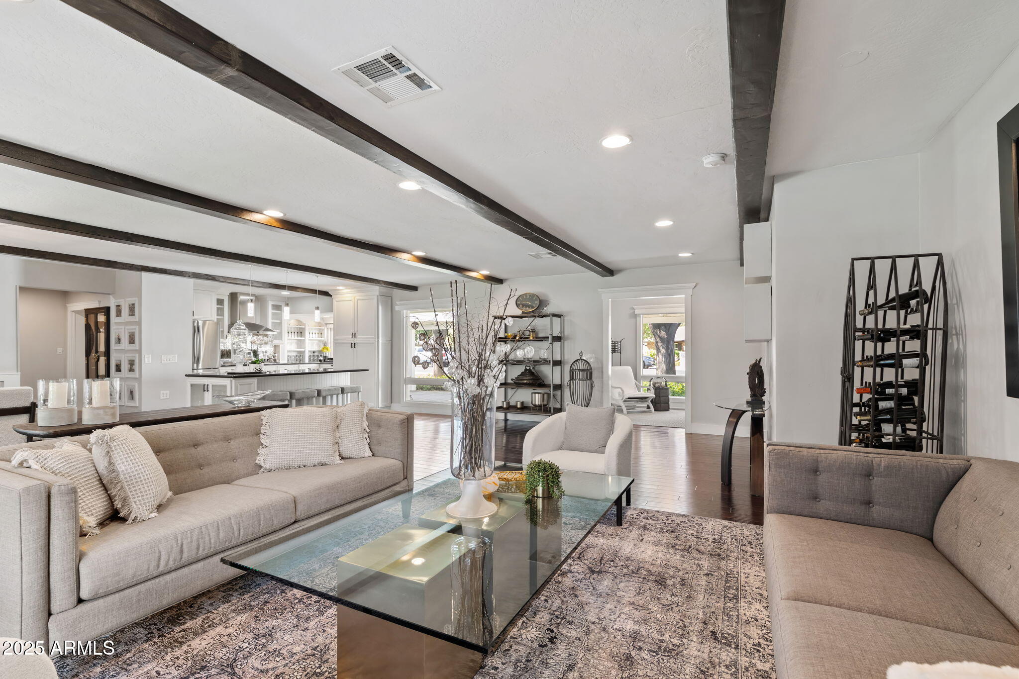 7519 North 12th Avenue Phoenix, AZ 85021 - Photo 12 of 52 a living room with furniture and view of kitchen