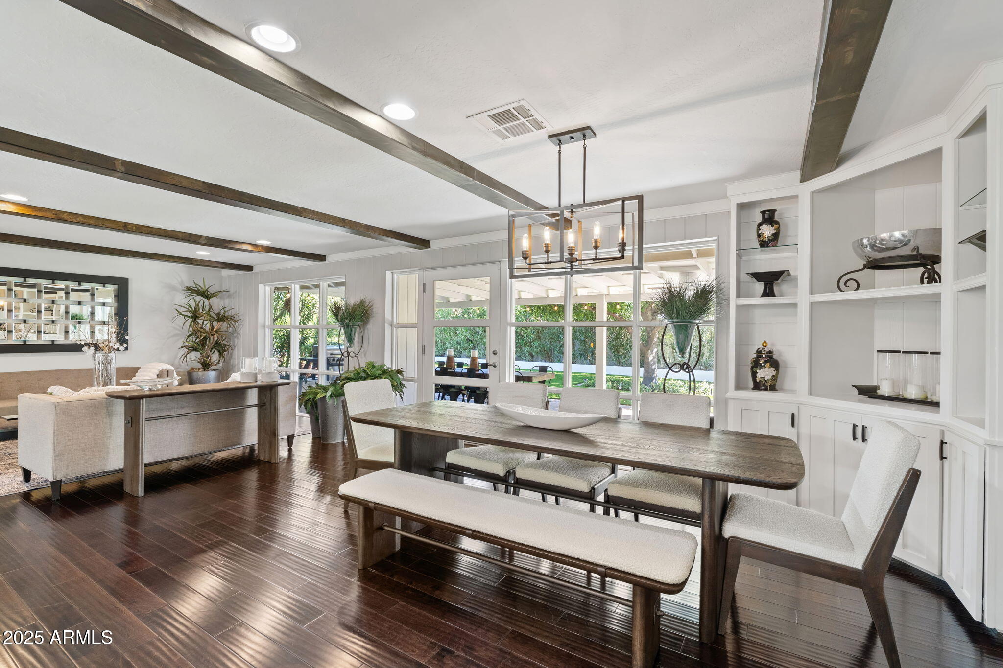 7519 North 12th Avenue Phoenix, AZ 85021 - Photo 17 of 52 a view of a dining room with furniture window and wooden floor