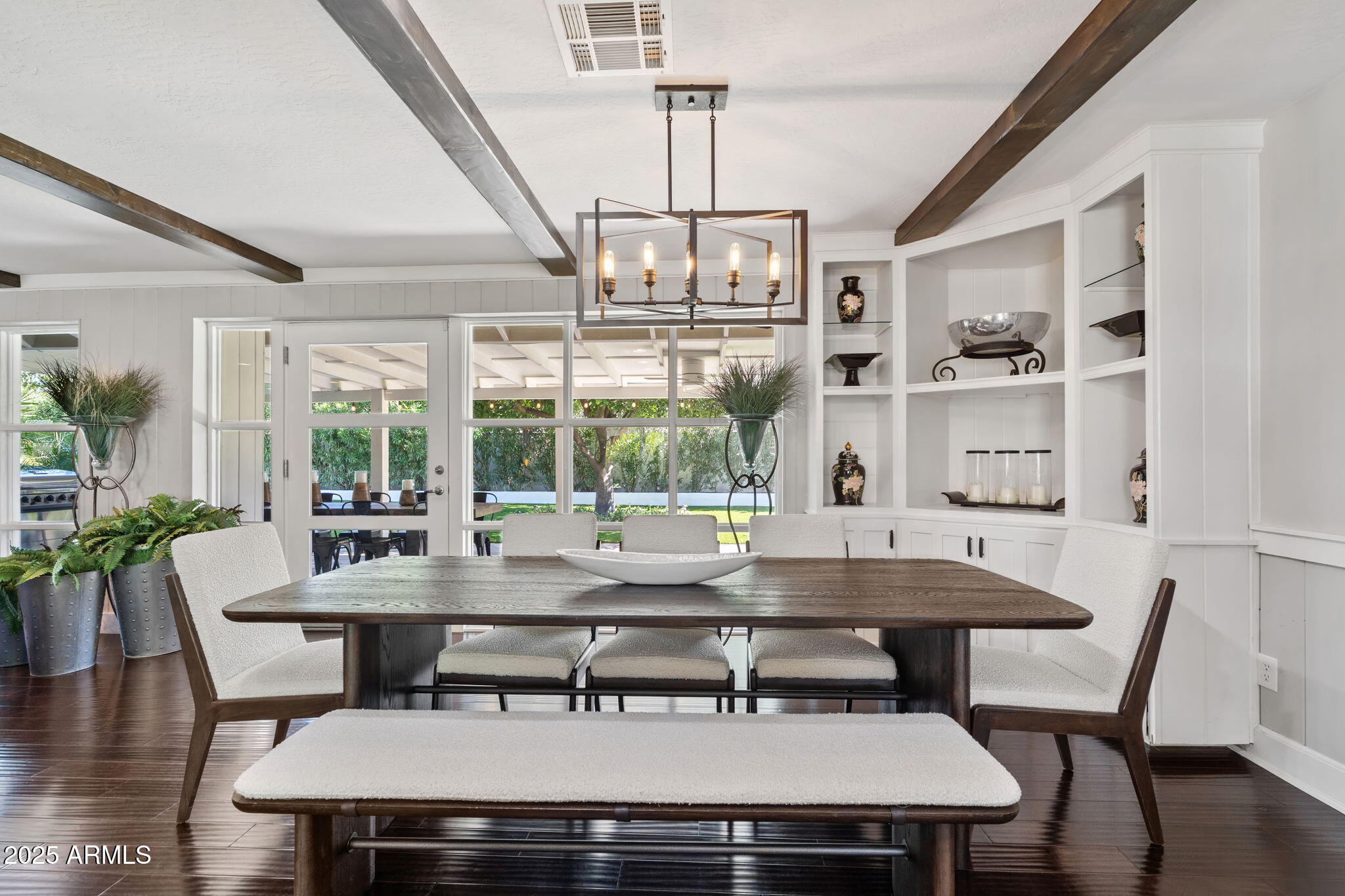 7519 North 12th Avenue Phoenix, AZ 85021 - Photo 18 of 52 a view of a dining room with furniture window and outside view