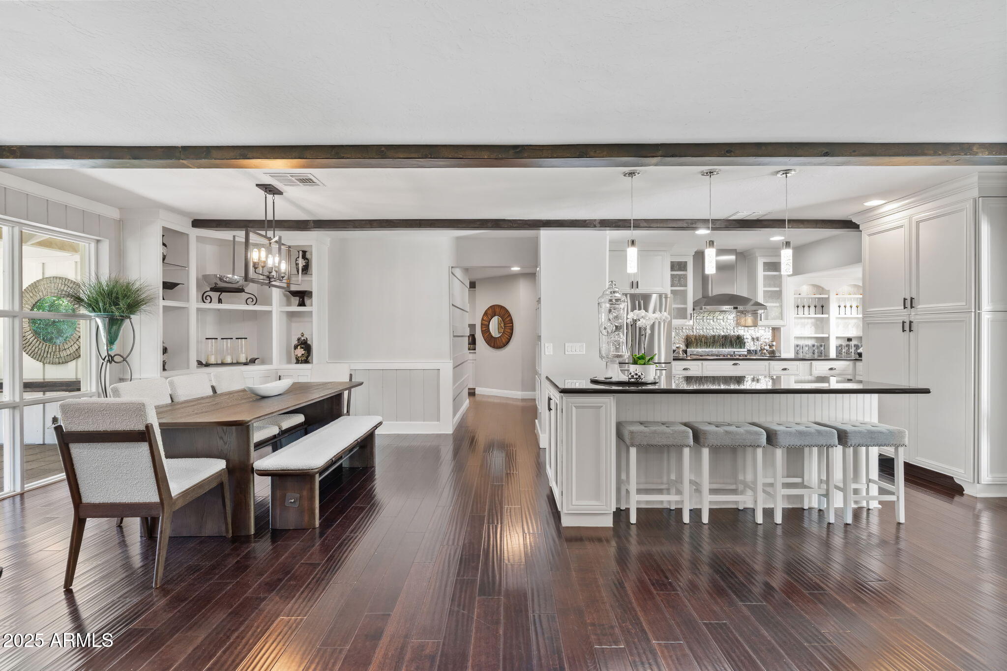 7519 North 12th Avenue Phoenix, AZ 85021 - Photo 20 of 52 a dining table with chairs and wooden floor
