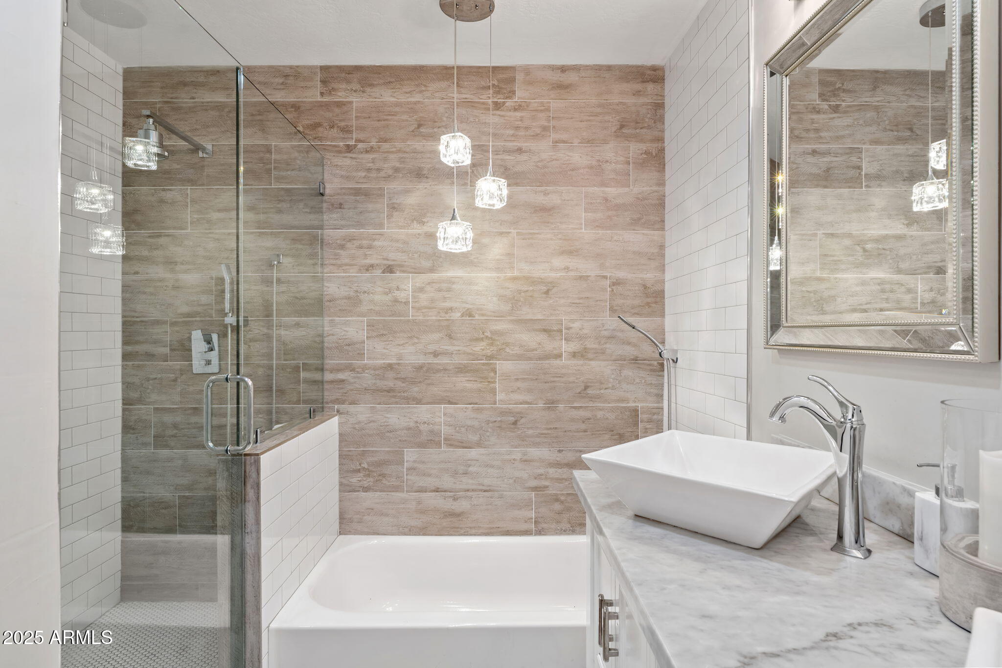 7519 North 12th Avenue Phoenix, AZ 85021 - Photo 23 of 52 a bathroom with a bathtub and a shower
