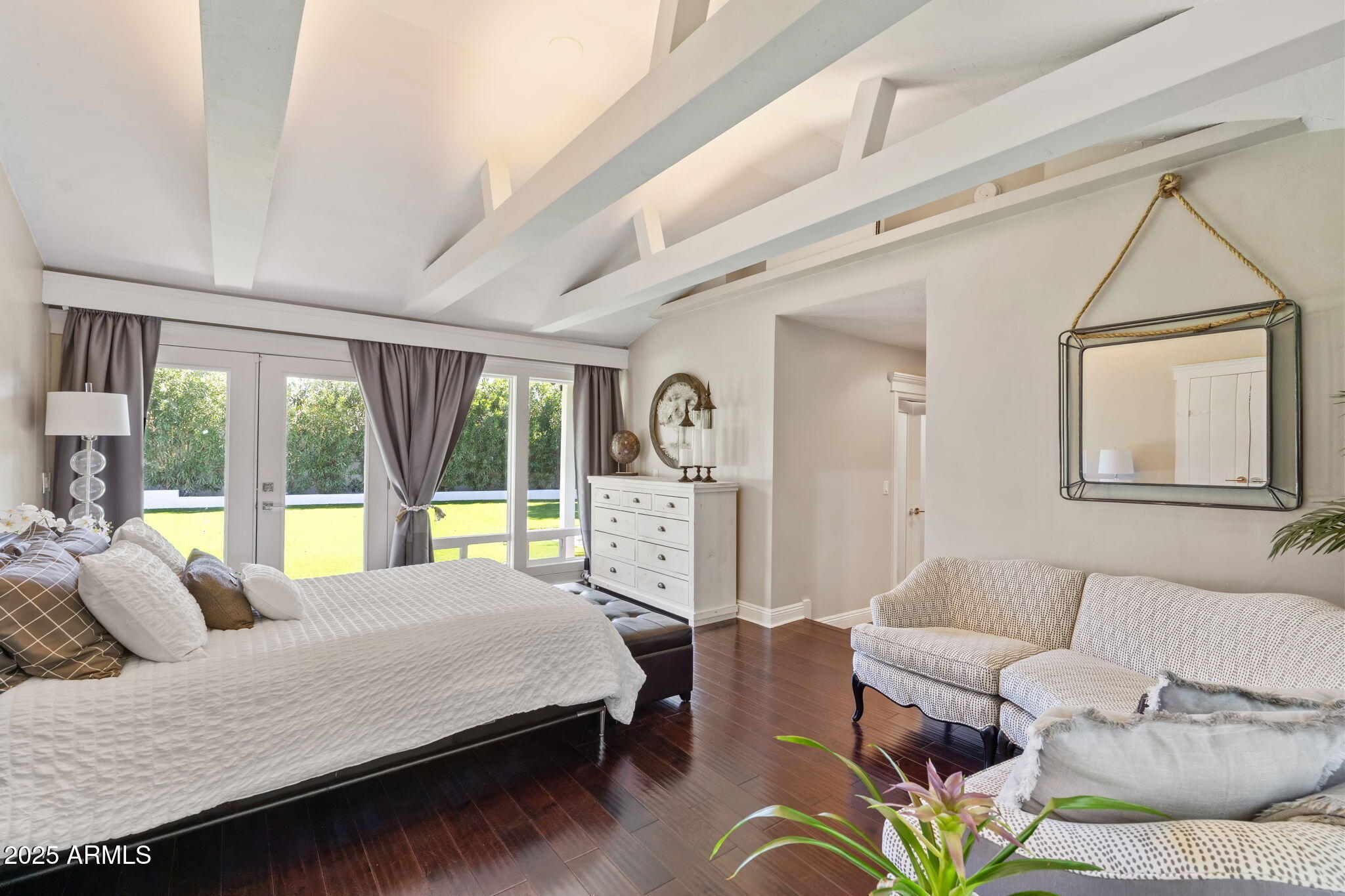 7519 North 12th Avenue Phoenix, AZ 85021 - Photo 27 of 52 a living room with furniture and a large window