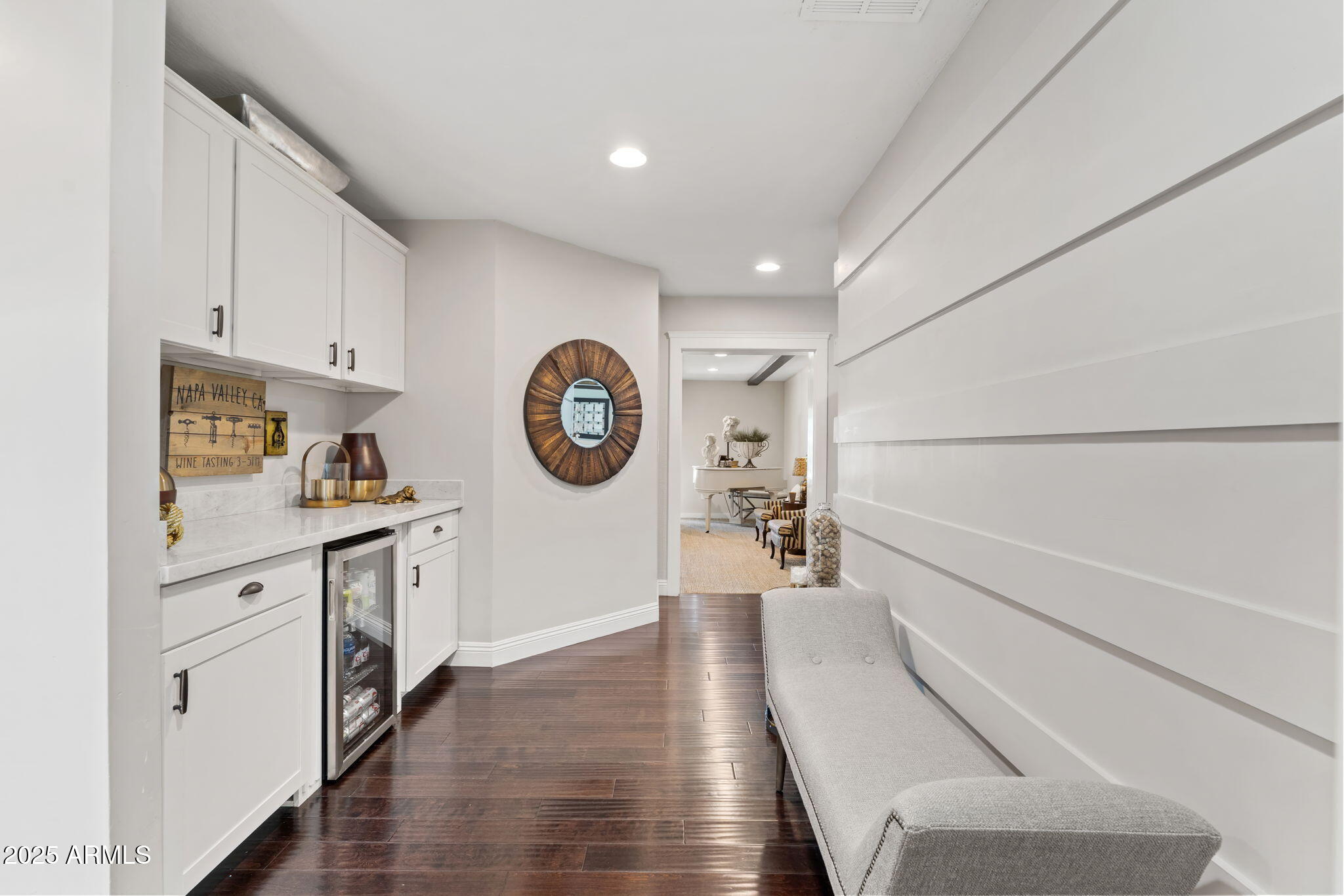 7519 North 12th Avenue Phoenix, AZ 85021 - Photo 32 of 52 a view of a kitchen with cabinets and wooden floor