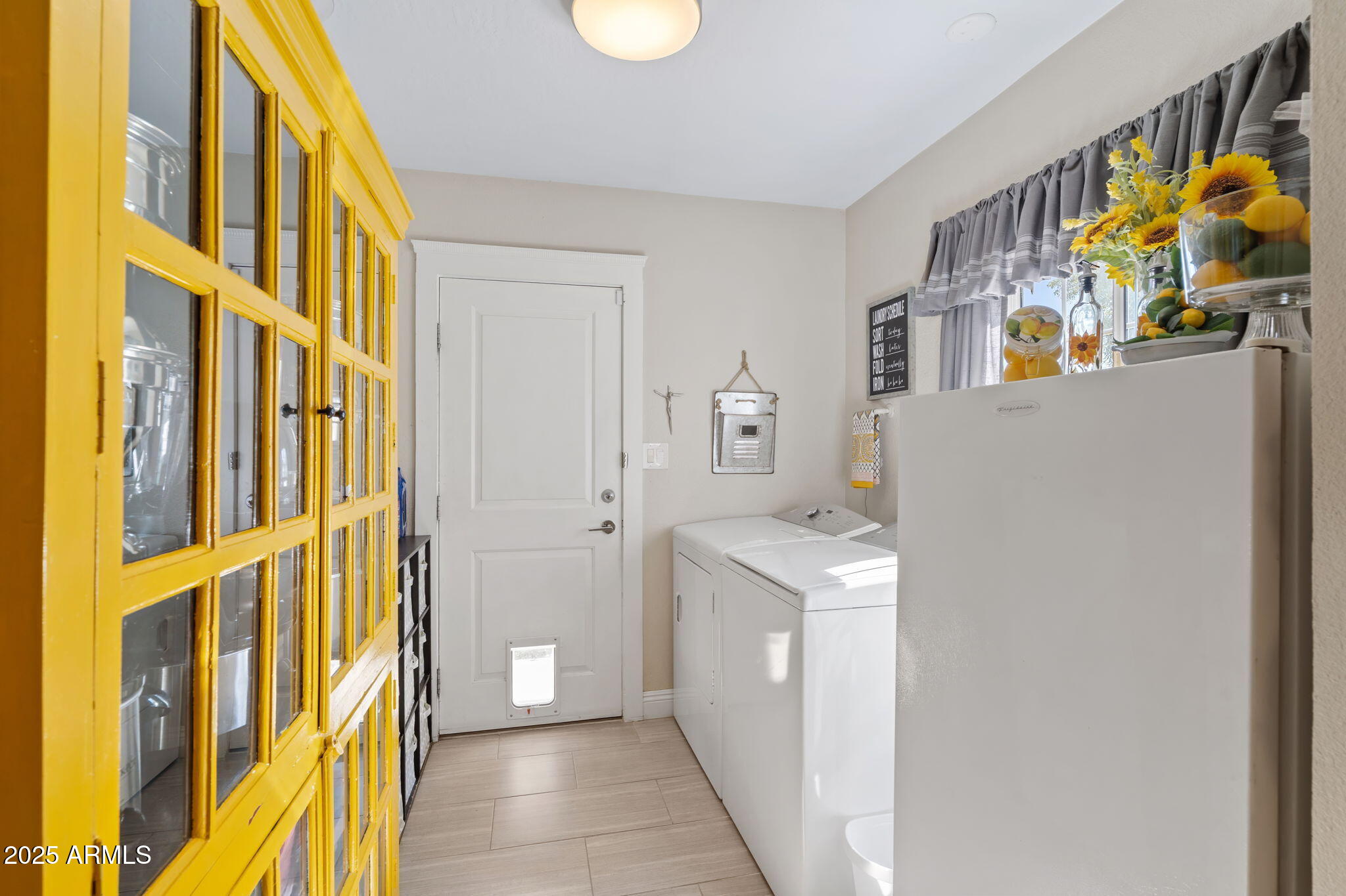 7519 North 12th Avenue Phoenix, AZ 85021 - Photo 37 of 52 a hallway with washer and dryer