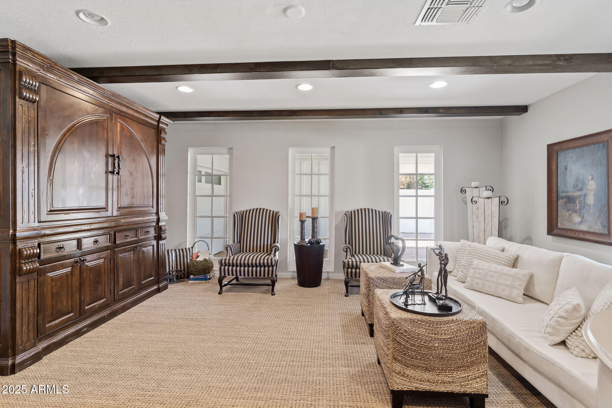 7519 North 12th Avenue Phoenix, AZ 85021 - Photo 40 of 52 a living room with furniture a large window and potted plant