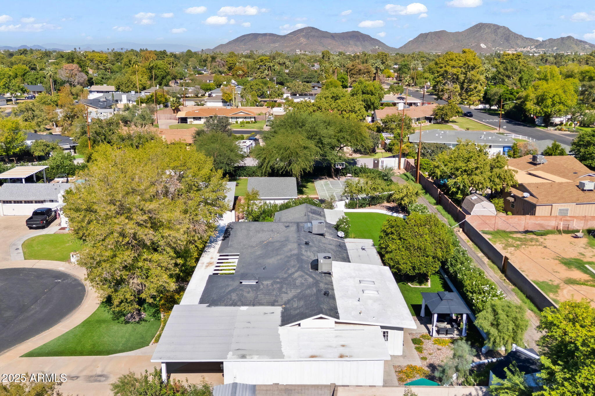 7519 North 12th Avenue Phoenix, AZ 85021 - Photo 50 of 52 an aerial view of residential houses with outdoor space