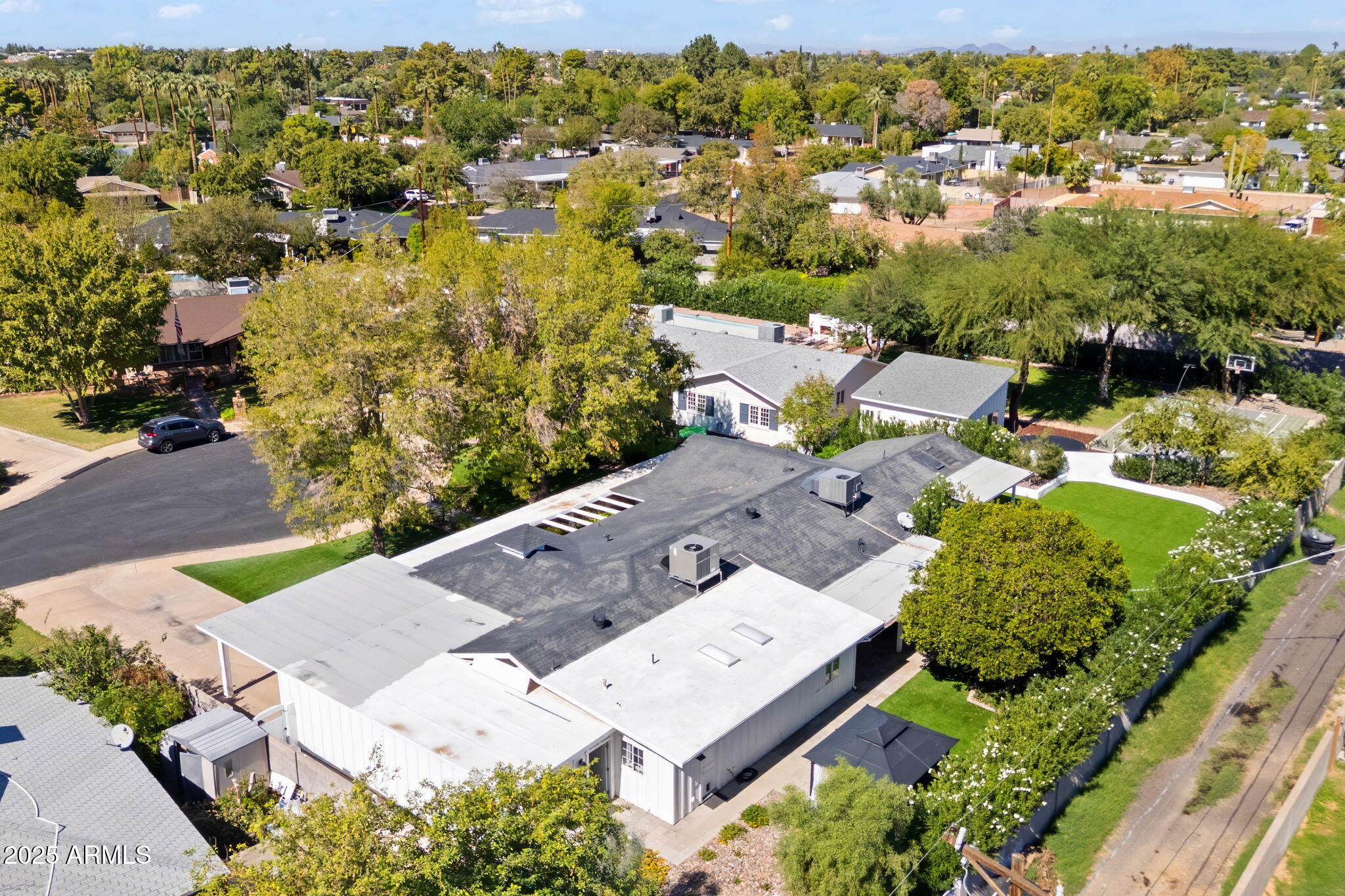 7519 North 12th Avenue Phoenix, AZ 85021 - Photo 51 of 52 an aerial view of a house with a yard