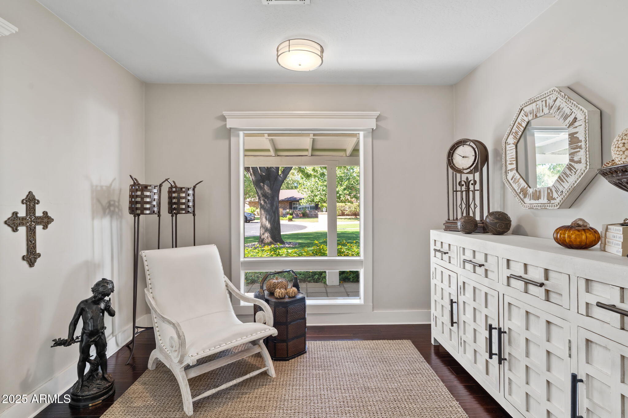 7519 North 12th Avenue Phoenix, AZ 85021 - Photo 8 of 52 a living room with furniture and a window