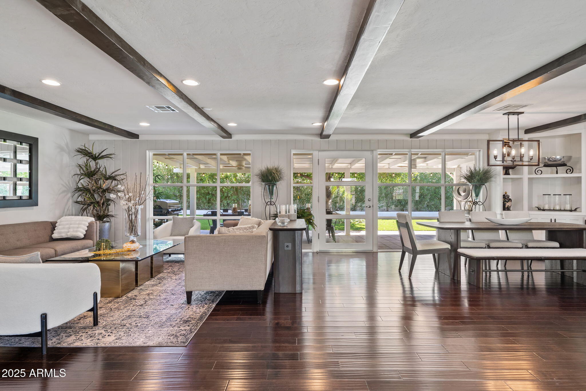 7519 North 12th Avenue Phoenix, AZ 85021 - Photo 10 of 52 a living room with furniture and a large window