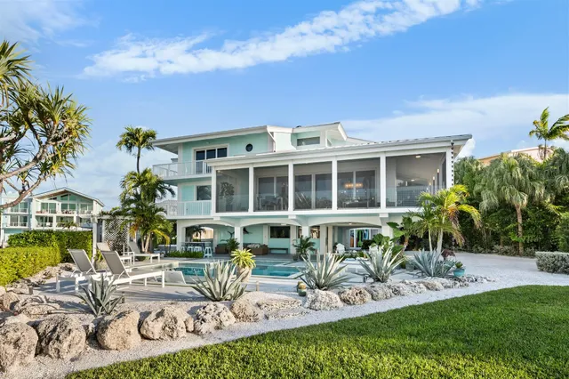 an aerial view of a house with a garden
