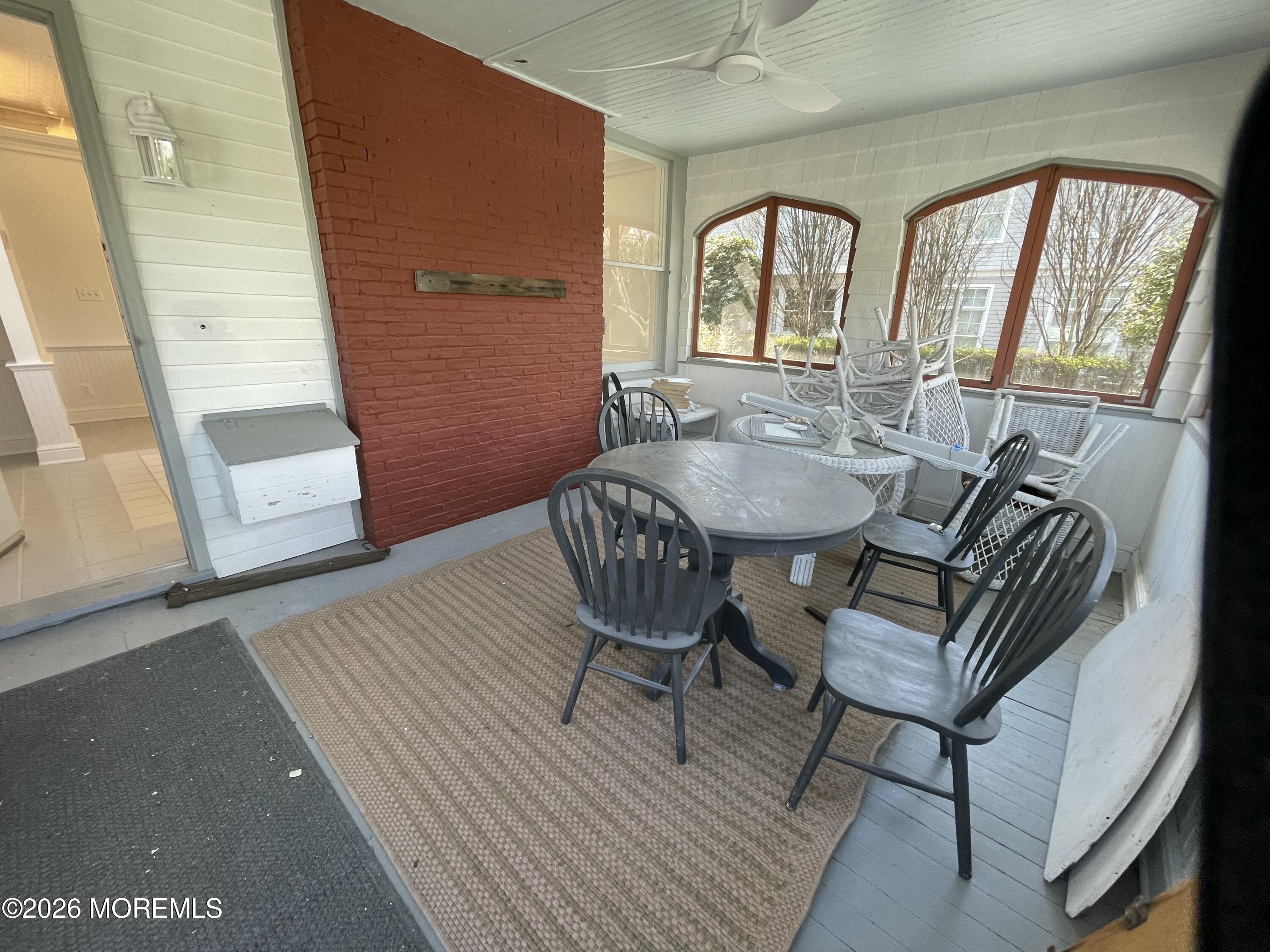 211 Cedar Avenue Allenhurst, NJ 07711 - Photo 18 of 20 a view of a livingroom with furniture window and wooden floor