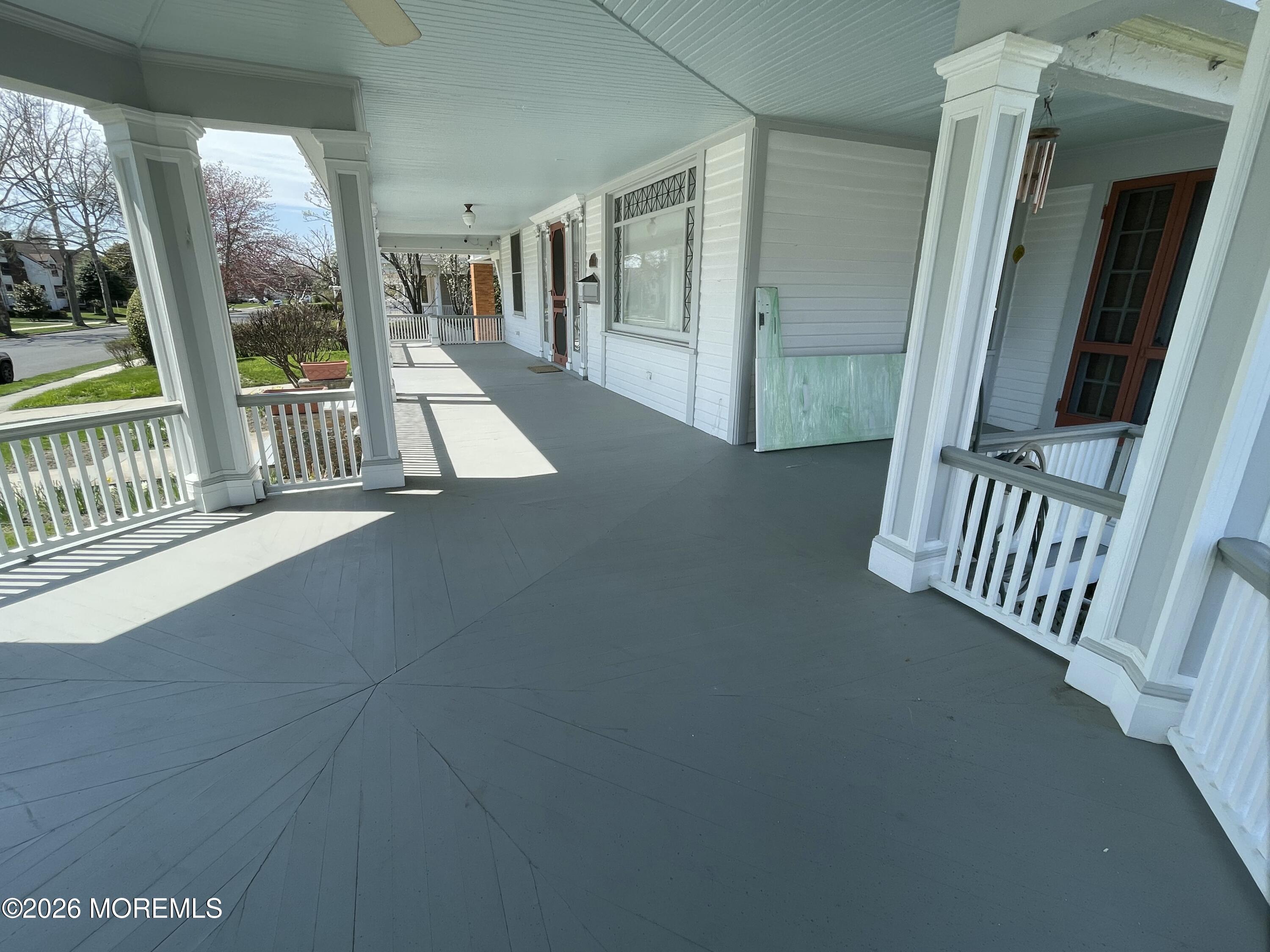 211 Cedar Avenue Allenhurst, NJ 07711 - Photo 2 of 20 a view of entryway with wooden floor and windows