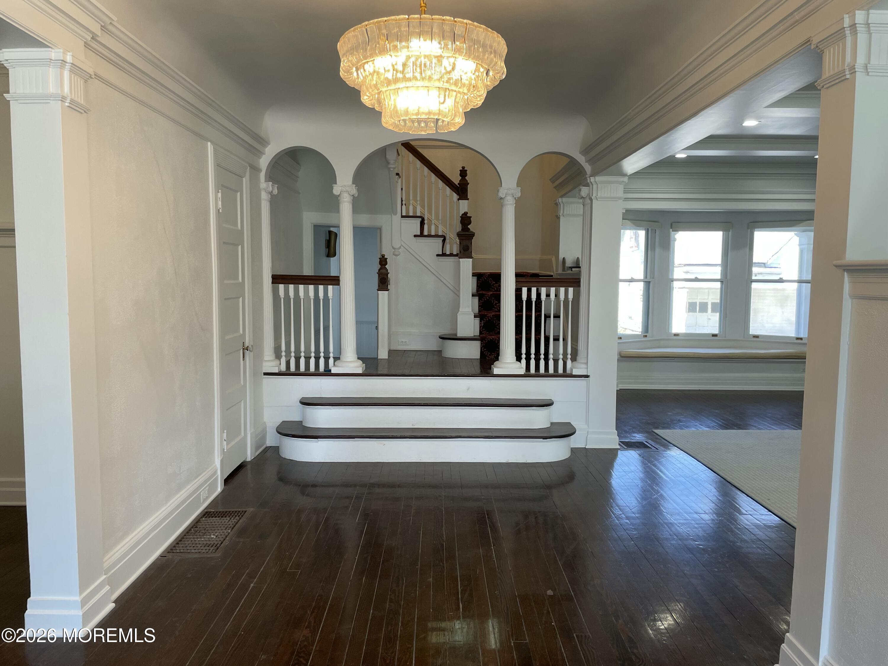 211 Cedar Avenue Allenhurst, NJ 07711 - Photo 3 of 20 a view of entryway with wooden floor