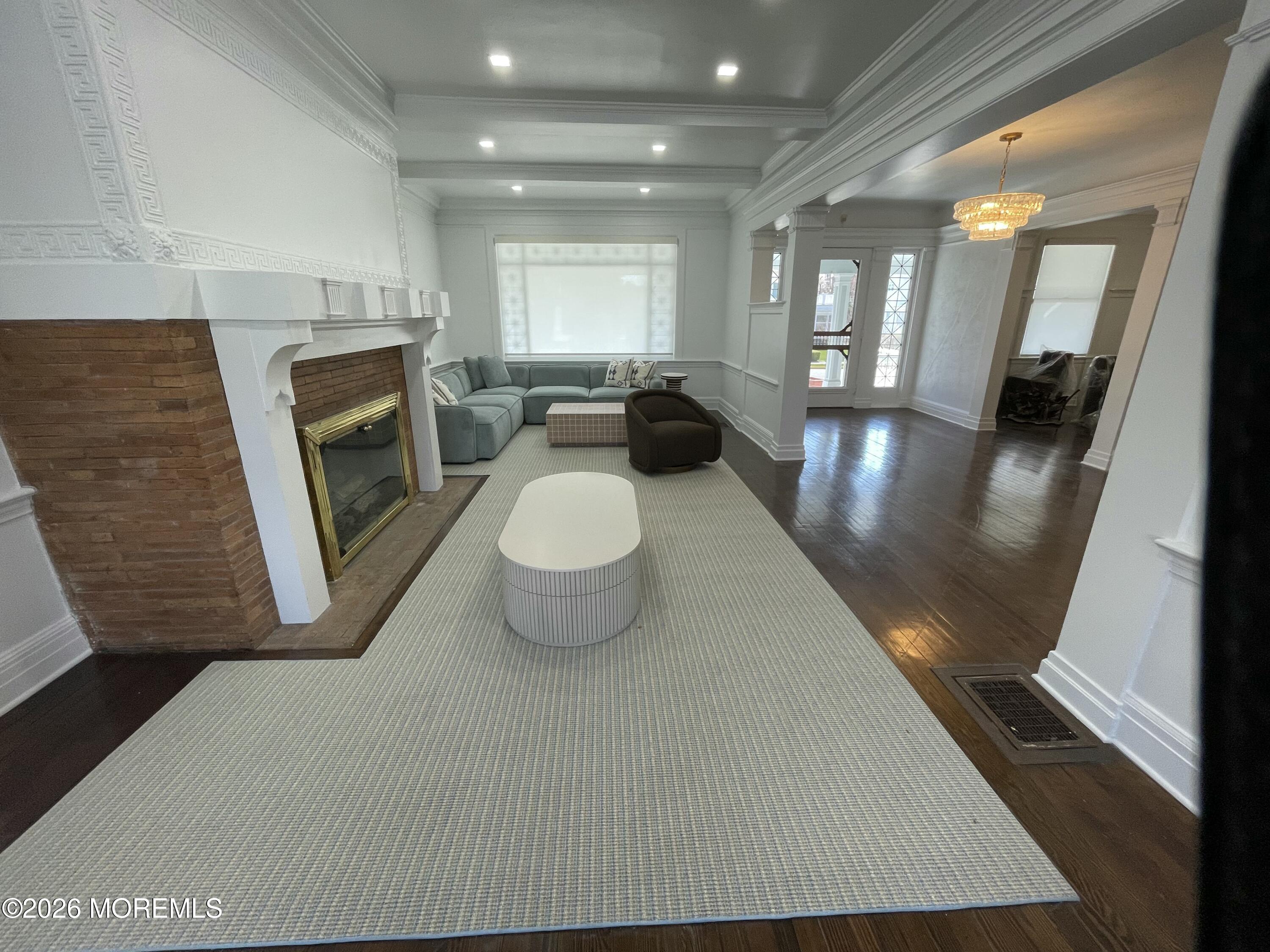 211 Cedar Avenue Allenhurst, NJ 07711 - Photo 5 of 20 a view of a living room and dining room