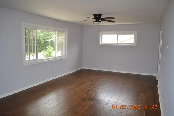a kitchen with a stove and cabinets
