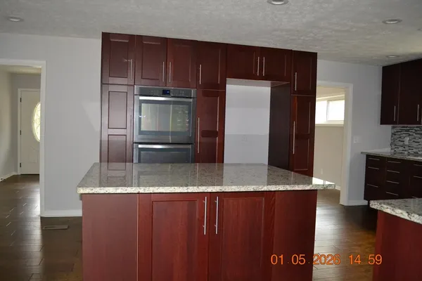 a bathroom with a shower and a tub