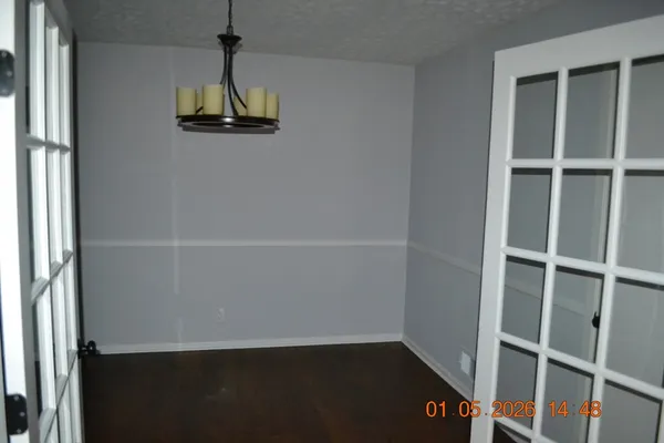 a view of backyard with tree