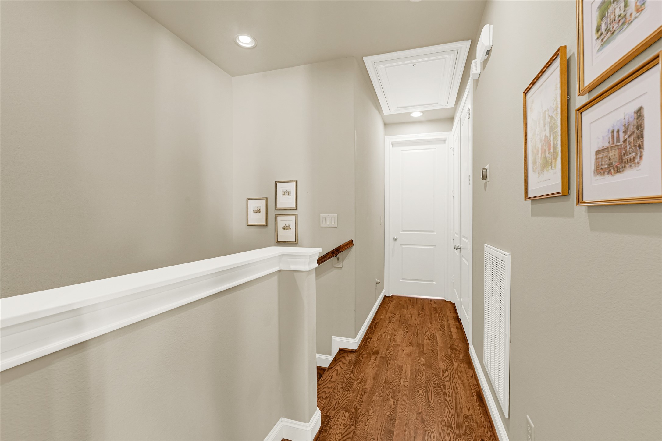 2039 Fannin Station North Houston, TX 77045 - Photo 16 of 25 a view of a hallway with wooden floor