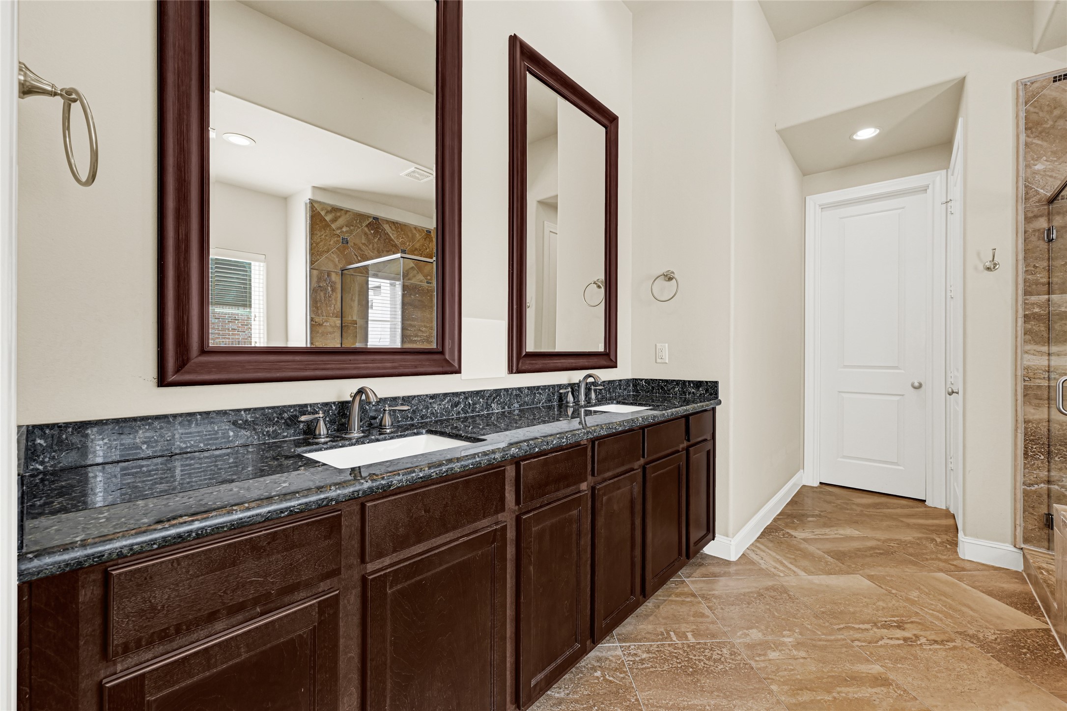 2039 Fannin Station North Houston, TX 77045 - Photo 20 of 25 a bathroom with a sink and a mirror