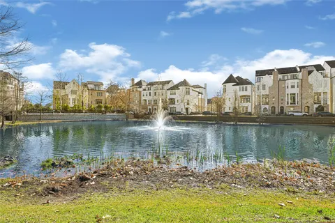 a view of a lake with houses