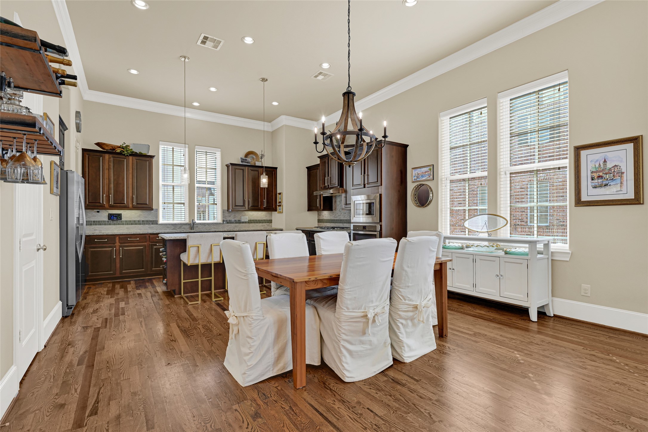 2039 Fannin Station North Houston, TX 77045 - Photo 4 of 25 a large kitchen with a table and chairs