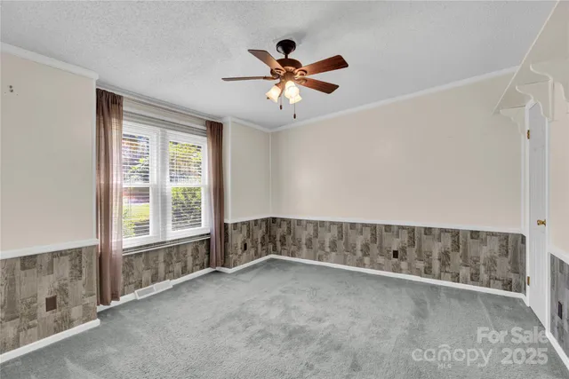a view of a kitchen with electric appliances