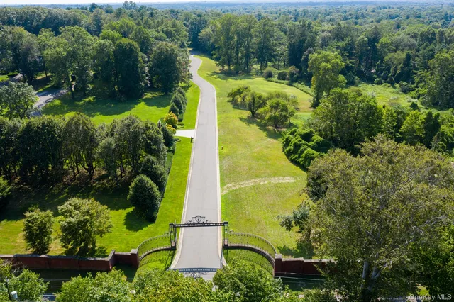 an aerial view of a house with a garden