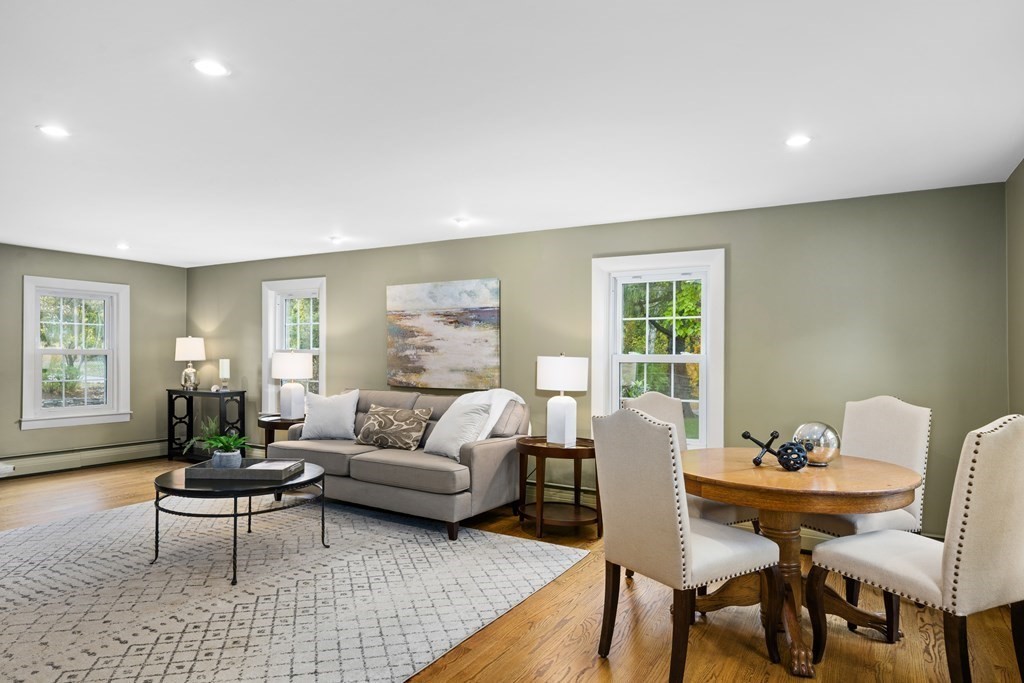 3 Howe Street Ashland, MA 01721 - Photo 11 of 37 a living room with furniture wooden floor and a window