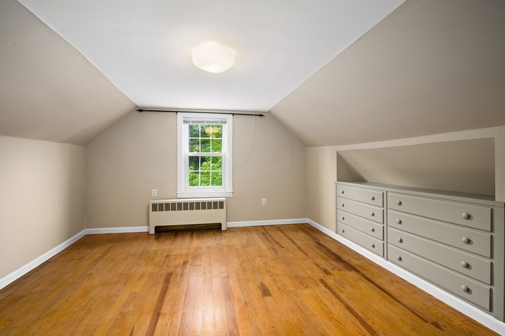3 Howe Street Ashland, MA 01721 - Photo 24 of 37 wooden floor in an empty room with a window
