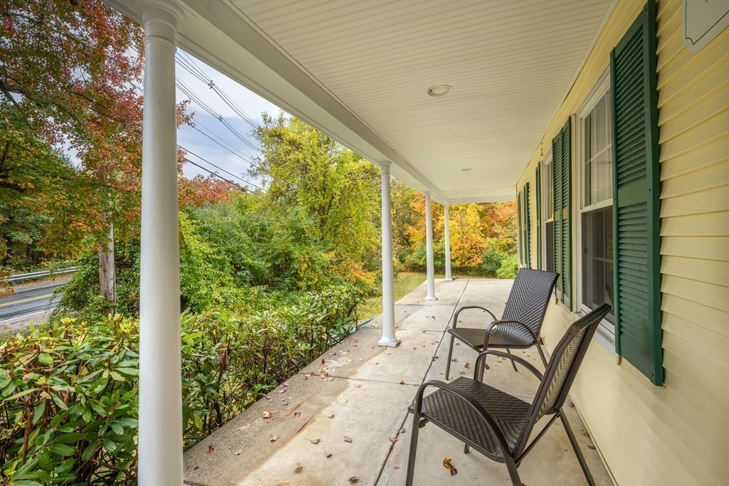 3 Howe Street Ashland, MA 01721 - Photo 30 of 37 a view of an chairs and table in the balcony
