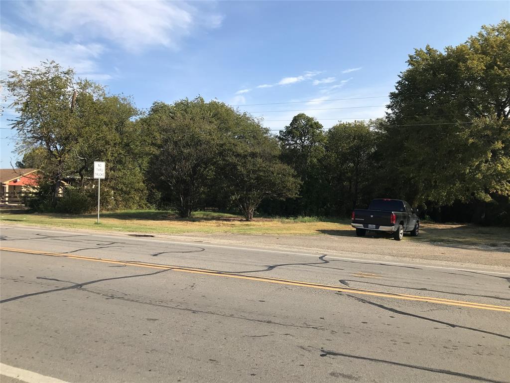 801 South Main Street Mansfield, TX 76063 - Photo 2 of 4 a view of a yard with palm trees