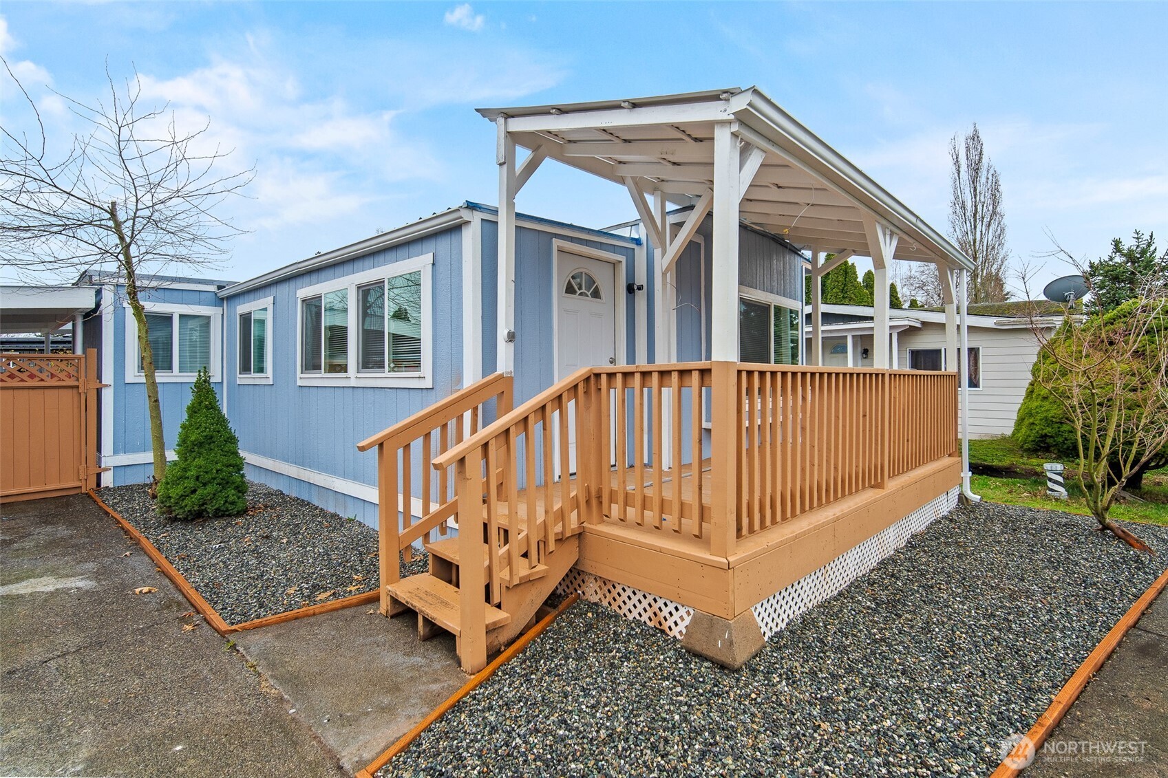 2392 Douglas Road, Unit 4 Ferndale, WA 98248 - Photo 1 of 39 a view of a house with a yard and deck