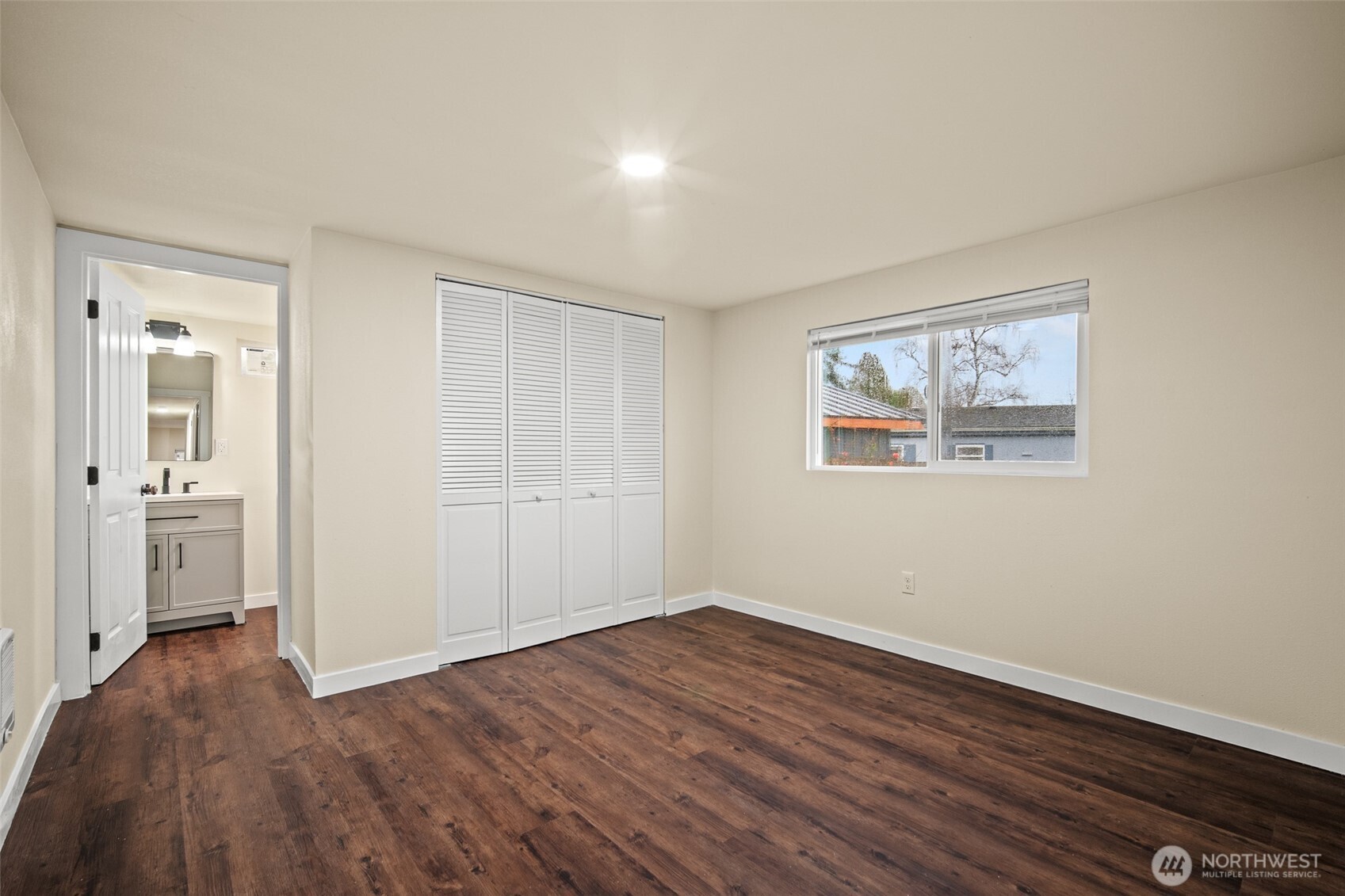 2392 Douglas Road, Unit 4 Ferndale, WA 98248 - Photo 17 of 39 a view of empty room with wooden floor and window