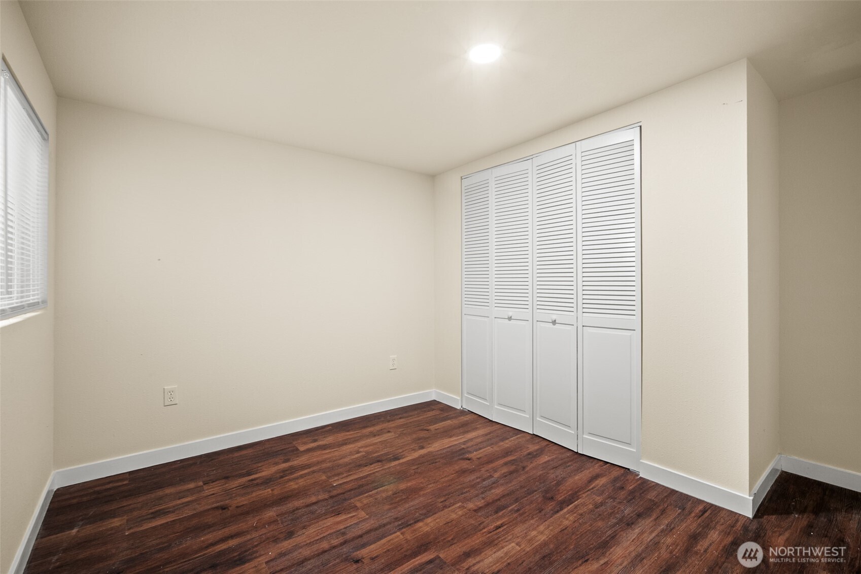2392 Douglas Road, Unit 4 Ferndale, WA 98248 - Photo 20 of 39 a view of an empty room with wooden floor